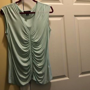 Sleeveless lightweight rayon/spandex top.